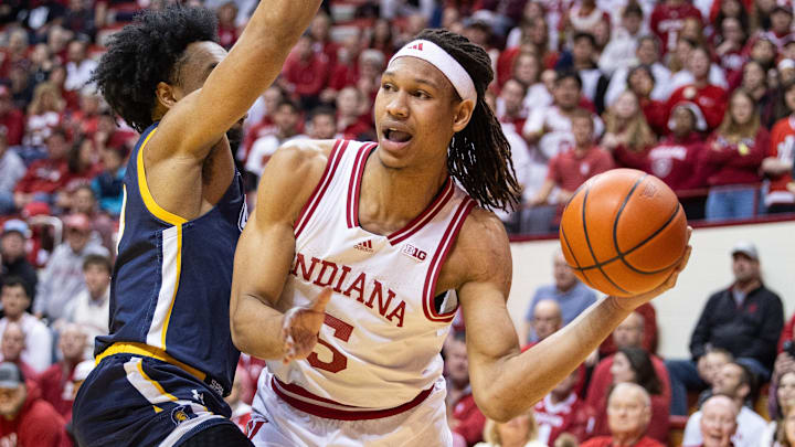 Indiana forward Malik Reneau (5) passes against UNC-Greensboro at Simon Skjodt Assembly Hall. 