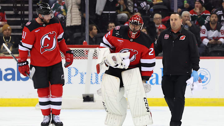 Jan 22, 2025; Newark, New Jersey, USA; New Jersey Devils goaltender Jacob Markstrom (25) is injured during the second period of their game against the Boston Bruins at Prudential Center. Mandatory Credit: Ed Mulholland-Imagn Images