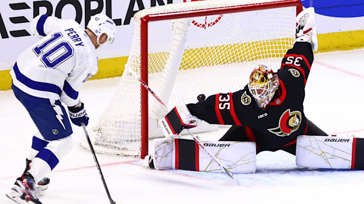 Apr 7, 2026; Ottawa, Ontario, CAN;  Tampa Bay Lightning right wing Corey Perry (10) scores on Ottawa Senators goaltender Linus Ullmark (35) during the third period at Canadian Tire Centre. Mandatory Credit: Keito Newman-Imagn Images

