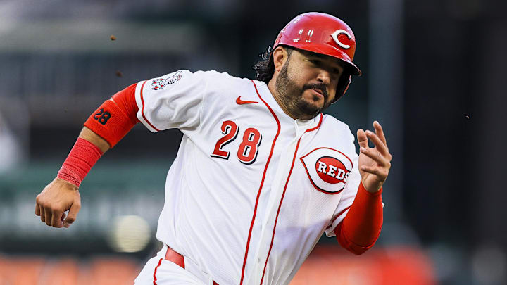 Cincinnati Reds designated hitter Eugenio Suarez (28) scores