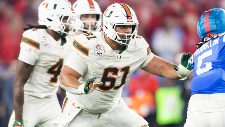 Miami Hurricanes offensive lineman Francis Mauigoa (61) against the Mississippi Rebels during the 2026 Fiesta Bowl and semifinal game of the College Football Playoff at State Farm Stadium. Miami Hurricanes offensive lineman Francis Mauigoa (61) against the Mississippi Rebels during the 2026 Fiesta Bowl and semifinal game of the College Football Playoff at State Farm Stadium.