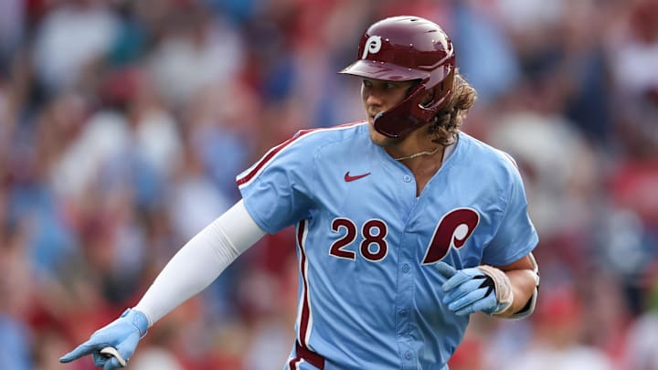 Aug 15, 2024; Philadelphia, Pennsylvania, USA; Philadelphia Phillies third base Alec Bohm (28) reacts after hitting a three RBI home run during the first inning against the Washington Nationals at Citizens Bank Park.