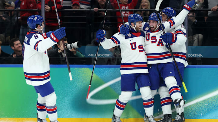 [US, Mexico & Canada customers only] Feb 20, 2026; Milan, Italy; Dylan Larkin of United States celebrates with teammates after scoring their first goal  against Slovakia in a men's ice hockey semifinal during the Milano Cortina 2026 Olympic Winter Games at Milano Santagiulia Ice Hockey Arena. Mandatory Credit: Mike Segar/Reuters via Imagn Images