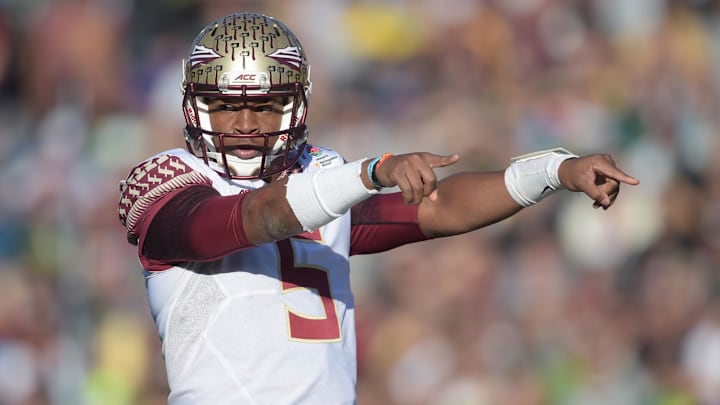 Jan 1, 2015; Pasadena, CA, USA; Florida State Seminoles quarterback Jameis Winston (5) gestures during the 2015 Rose Bowl college football game against the Oregon Ducks at Rose Bowl. Oregon defeated Florida State 59-20. Mandatory Credit: Kirby Lee-Imagn Images