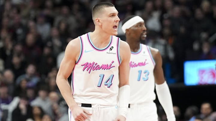 Feb 21, 2025; Toronto, Ontario, CAN; Miami Heat guard Tyler Herro (14) celebrates after scoring against the Toronto Raptors during the second half at Scotiabank Arena. Mandatory Credit: Kevin Sousa-Imagn Images