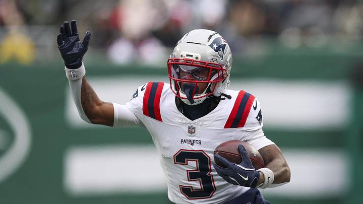 New England Patriots wide receiver Demario Douglas (3) runs the ball after a reception against the New York Jets during the first quarter of the game at MetLife Stadium. 