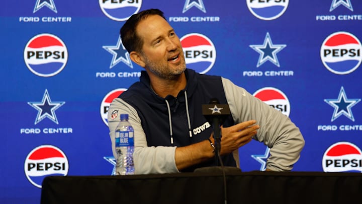 Dallas Cowboys head coach Brian Schottenheimer addresses the media before practice at the Ford Center at the Star Training Facility in Frisco, Texas. 