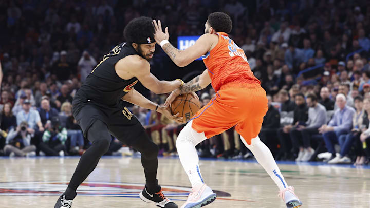 Jan 16, 2025; Oklahoma City, Oklahoma, USA;Oklahoma City Thunder forward Kenrich Williams (34) defends Cleveland Cavaliers center Jarrett Allen (31) during the second quarter at Paycom Center. Mandatory Credit: Alonzo Adams-Imagn Images Jan 16, 2025; Oklahoma City, Oklahoma, USA;Oklahoma City Thunder forward Kenrich Williams (34) defends Cleveland Cavaliers center Jarrett Allen (31) during the second quarter at Paycom Center. Mandatory Credit: Alonzo Adams-Imagn Images