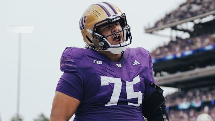 Starting center D'Angalo Titialii was questionable for the Iowa game. 