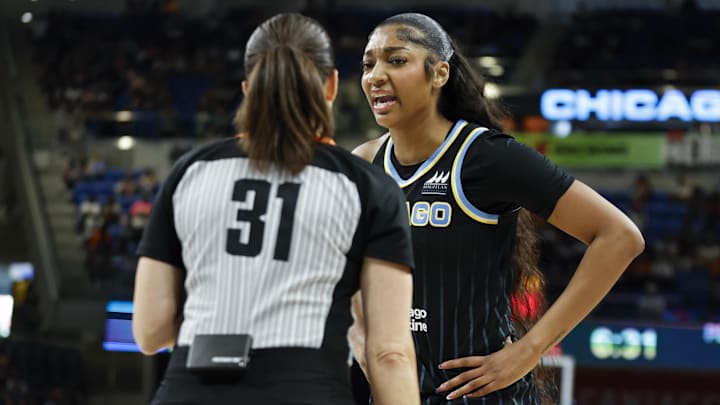 Aug 25, 2024; Chicago, Illinois, USA; Chicago Sky forward Angel Reese (5) talks with official Amy Bonner during the first half of a basketball game against the Las Vegas Aces at Wintrust Arena. Mandatory Credit: Kamil Krzaczynski-Imagn Images