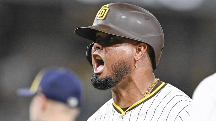 Sep 22, 2025; San Diego, California, USA; San Diego Padres first baseman Luis Arraez (4) celebrates after hitting an RBI single during the seventh inning against the Milwaukee Brewers at Petco Park. Mandatory Credit: Denis Poroy-Imagn Images Sep 22, 2025; San Diego, California, USA; San Diego Padres first baseman Luis Arraez (4) celebrates after hitting an RBI single during the seventh inning against the Milwaukee Brewers at Petco Park. Mandatory Credit: Denis Poroy-Imagn Images
