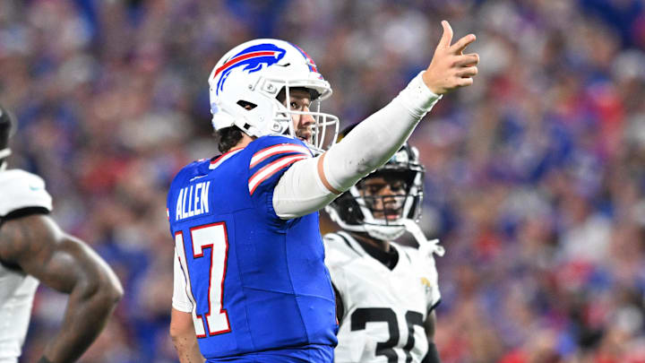 Sep 23, 2024; Orchard Park, New York, USA; Buffalo Bills quarterback Josh Allen (17) signals for a first down against the Jacksonville Jaguars in the second quarter at Highmark Stadium.
