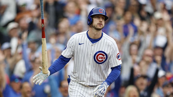 Apr 18, 2025; Chicago, Illinois, USA; Chicago Cubs outfielder Kyle Tucker (30) watches his two-run home run against the Arizona Diamondbacks during the eighth inning at Wrigley Field.