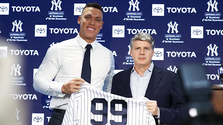 Dec 21, 2022; Bronx, New York, USA; Aaron Judge poses with Hal Steinbrenner during a press conference at Yankee Stadium. Mandatory Credit: Jessica Alcheh-Imagn Images