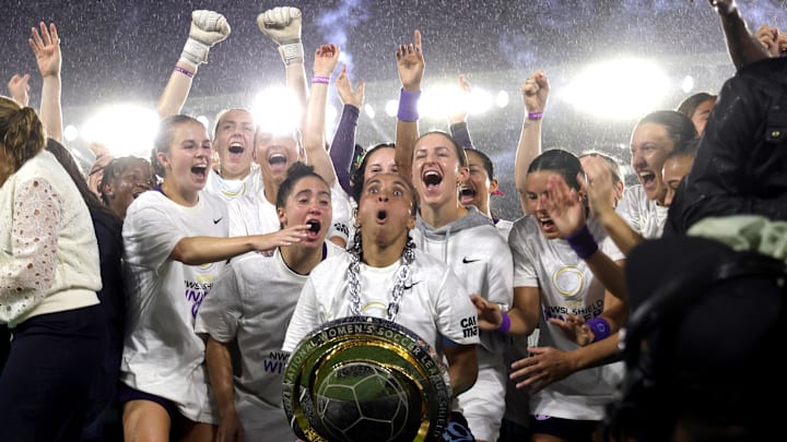 Orlando Pride forward Marta (10) holds the 2024 NWSL Shield awarded to them at the end of their match against Washington Spirit at Inter&Co Stadium 