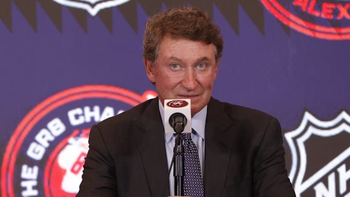 Apr 4, 2025; Washington, District of Columbia, USA; Wayne Gretzky speaks during a press conference with Washington Capitals left wing Alex Ovechkin (not pictured) after the game against the Chicago Blackhawks at Capital One Arena. Ovechkin scored the 893rd and 894th goals of his career, tying Gretzky for most all-time goals in NHL history at Capital One Arena. Mandatory Credit: Amber Searls-Imagn Images