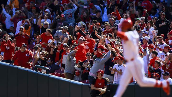 Mar 29, 2026; Cincinnati, Ohio, USA; Fans celebrate after Cincinnati Reds third baseman Eugenio Suarez (28) hits a three-run home run in the sixth inning against the Boston Red Sox at Great American Ball Park. Mandatory Credit: Katie Stratman-Imagn Images