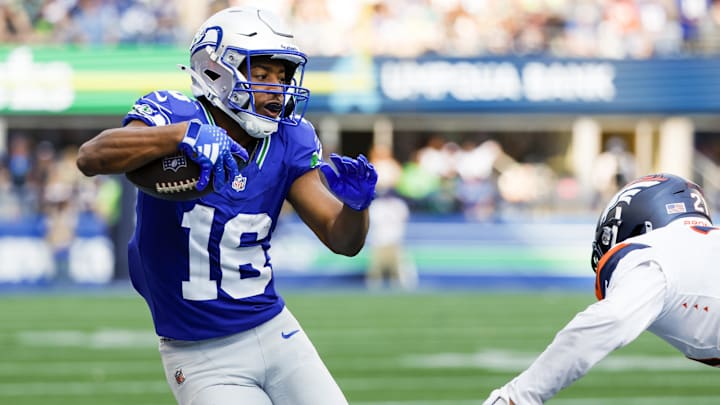 Seattle Seahawks wide receiver Tyler Lockett runs for yards after the catch against the Denver Broncos.