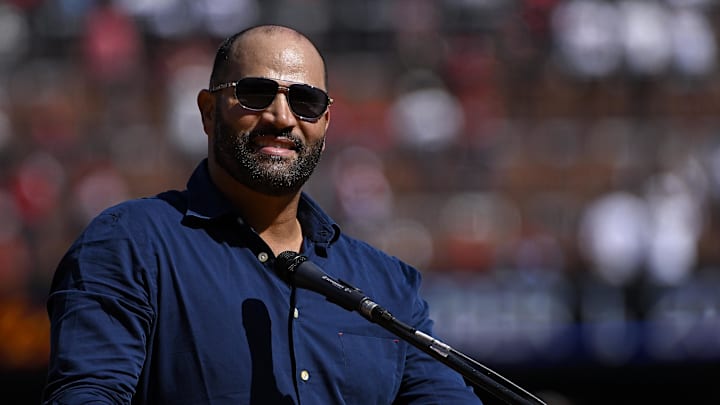 Oct 1, 2023; St. Louis, Missouri, USA; St. Louis Cardinals former player Albert Pujols speaks at a retirement ceremony for starting pitcher Adam Wainwright (not pictured) before a game against the Cincinnati Reds at Busch Stadium. Mandatory Credit: Jeff Curry-Imagn Images Oct 1, 2023; St. Louis, Missouri, USA; St. Louis Cardinals former player Albert Pujols speaks at a retirement ceremony for starting pitcher Adam Wainwright (not pictured) before a game against the Cincinnati Reds at Busch Stadium. Mandatory Credit: Jeff Curry-Imagn Images