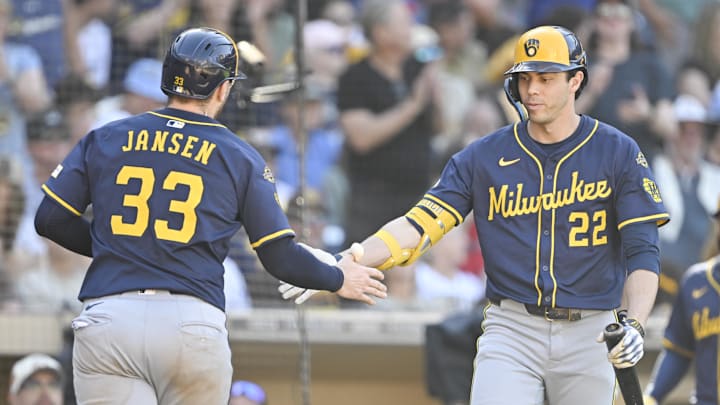 Sep 24, 2025; San Diego, California, USA; Milwaukee Brewers catcher Danny Jansen (33) is congratulated by Christian Yelich (22) after hitting a solo home run during the ninth inning against the San Diego Padres at Petco Park. Mandatory Credit: Denis Poroy-Imagn Images Sep 24, 2025; San Diego, California, USA; Milwaukee Brewers catcher Danny Jansen (33) is congratulated by Christian Yelich (22) after hitting a solo home run during the ninth inning against the San Diego Padres at Petco Park. Mandatory Credit: Denis Poroy-Imagn Images