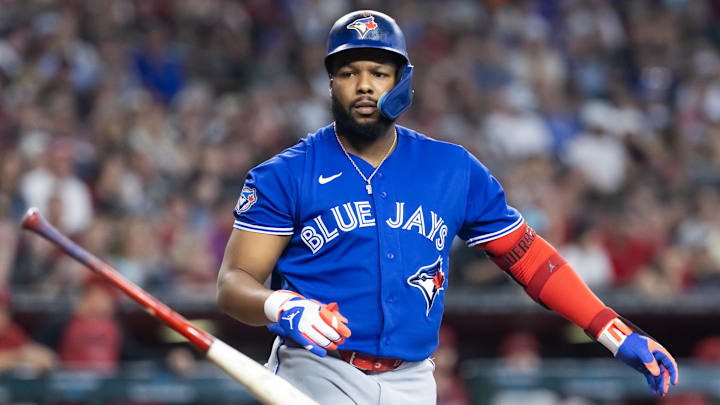 Apr 19, 2026; Phoenix, Arizona, USA; Toronto Blue Jays first baseman Vladimir Guerrero Jr. tosses his bat after striking out in the first inning against the Arizona Diamondbacks at Chase Field. Mandatory Credit: Mark J. Rebilas-Imagn Images
