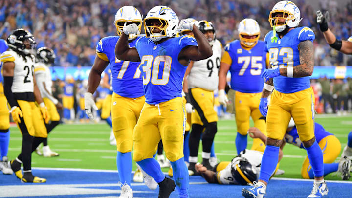 Nov 9, 2025; Inglewood, California, USA; Los Angeles Chargers running back Kimani Vidal (30) celebrates after scoring a touchdown against the Pittsburgh Steelers during the fourth quarter of the game at SoFi Stadium. Mandatory Credit: Gary A. Vasquez-Imagn Images