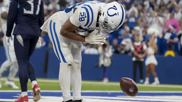 Dec 22, 2024; Indianapolis, Indiana, USA; Indianapolis Colts running back Jonathan Taylor (28) celebrates after rushing for a touchdown during a game against the Tennessee Titans at Lucas Oil Stadium. Mandatory Credit: Grace Hollars/USA Today Network via Imagn Images 