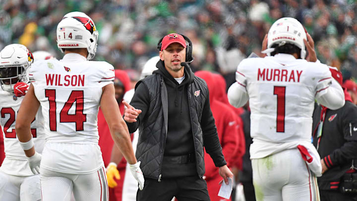 Dec 31, 2023; Philadelphia, Pennsylvania, USA; Arizona Cardinals head coach Jonathan Gannon celebrates touchdown with wide receiver Michael Wilson (14) and quarterback Kyler Murray (1) during the fourth quarter against the Philadelphia Eagles at Lincoln Financial Field. Mandatory Credit: Eric Hartline-Imagn Images