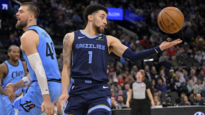 Mar 21, 2025; Inglewood, California, USA; Memphis Grizzlies guard Scotty Pippen Jr. (1) reaches for the ball after blocking a dunk attempt by Los Angeles Clippers center Ivica Zubac (40) in the second half at Intuit Dome. Mandatory Credit: Jayne Kamin-Oncea-Imagn Images Mar 21, 2025; Inglewood, California, USA; Memphis Grizzlies guard Scotty Pippen Jr. (1) reaches for the ball after blocking a dunk attempt by Los Angeles Clippers center Ivica Zubac (40) in the second half at Intuit Dome. Mandatory Credit: Jayne Kamin-Oncea-Imagn Images