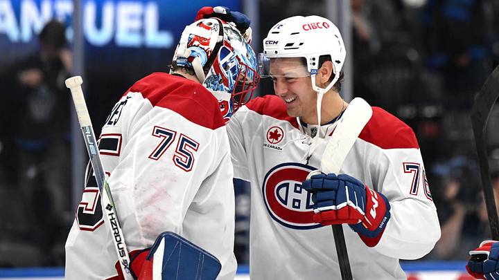 Sep 29, 2026; Toronto, Ontario, CAN;  Montreal Canadiens forward Zachary Bolduc (76) greets goalie Jakub Dobes (75) as they celebrate a win over the Toronto Maple Leafs at Scotiabank Arena.  Mandatory Credit: Dan Hamilton-Imagn Images