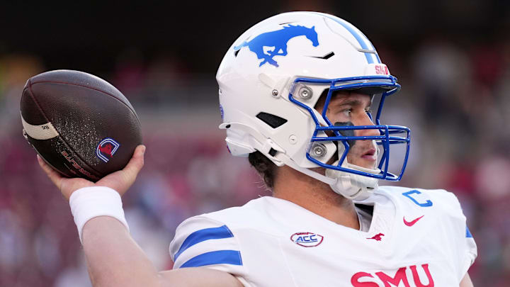 Oct 19, 2024; Stanford, California, USA; Southern Methodist Mustangs quarterback Preston Stone (2) warms up during the first quarter against the Stanford Cardinal at Stanford Stadium. Mandatory Credit: Darren Yamashita-Imagn Images
