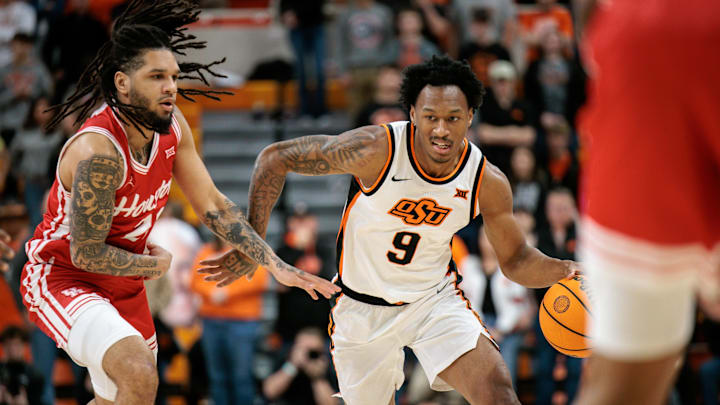 Mar 7, 2026; Stillwater, Oklahoma, USA; Oklahoma State Cowboys guard Anthony Roy (9) brings the ball up court during the first half against the Houston Cougars at Gallagher-Iba Arena. Mandatory Credit: William Purnell-Imagn Images