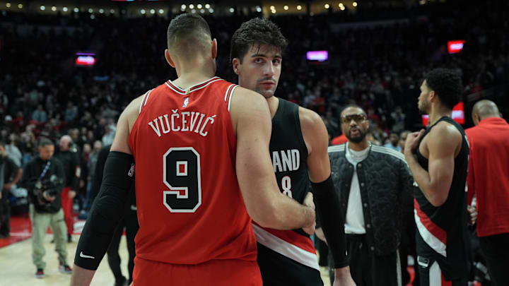 Nov 19, 2025; Portland, Oregon, USA; Chicago Bulls center Nikola Vucevic (9) and Portland Trail Blazers forward Deni Avdija (8) meet after the game at Moda Center. Mandatory Credit: Soobum Im-Imagn Images Nov 19, 2025; Portland, Oregon, USA; Chicago Bulls center Nikola Vucevic (9) and Portland Trail Blazers forward Deni Avdija (8) meet after the game at Moda Center. Mandatory Credit: Soobum Im-Imagn Images