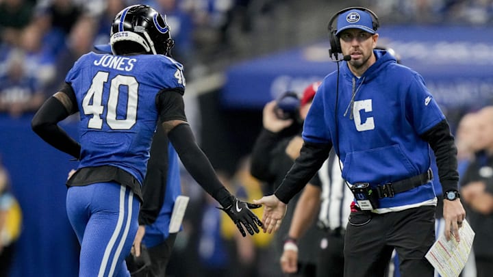 Nov 24, 2024; Indianapolis, Indiana, USA; Indianapolis Colts head coach Shane Steichen reaches for a high five from Indianapolis Colts cornerback Jaylon Jones (40) during a game against the Detroit Lions at Lucas Oil Stadium. Mandatory Credit: Christine Tannous/USA TODAY Network via Imagn Images