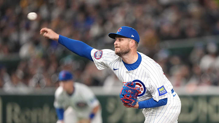 Mar 15, 2025; Bunkyo, Tokyo, Japan; Chicago Cubs pitcher Ryan Brasier (54) throws a pitch against the Hanshin Tigers during the sixth inning at Tokyo Dome.