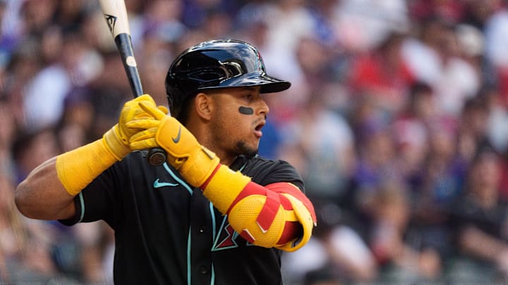 Apr 4, 2026; Phoenix, Arizona, USA; Arizona Diamondbacks catcher Gabriel Moreno (14) at bat in the second inning of a game against the Atlanta Braves at Chase Field. Mandatory Credit: Allan Henry-Imagn Images