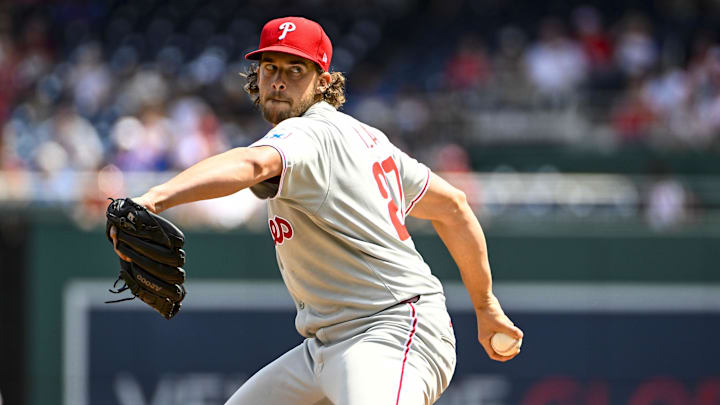 Aug 17, 2025; Washington, District of Columbia, USA; Philadelphia Phillies starting pitcher Aaron Nola (27) throws to the Washington Nationals during the first inning at Nationals Park. Aug 17, 2025; Washington, District of Columbia, USA; Philadelphia Phillies starting pitcher Aaron Nola (27) throws to the Washington Nationals during the first inning at Nationals Park.