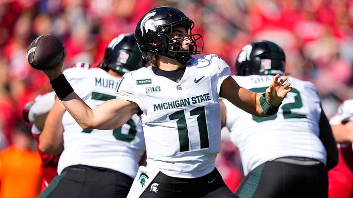 Oct 3, 2026; Madison, Wisconsin, USA; Michigan State Spartans quarterback Alessio Milivojevic (11) throws a pass during the first quarter against the Wisconsin Badgers at Camp Randall Stadium. Mandatory Credit: Jeff Hanisch-Imagn Images Oct 3, 2026; Madison, Wisconsin, USA; Michigan State Spartans quarterback Alessio Milivojevic (11) throws a pass during the first quarter against the Wisconsin Badgers at Camp Randall Stadium. Mandatory Credit: Jeff Hanisch-Imagn Images