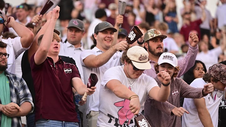 Mississippi State Bulldogs fans cheer during the fourth quarter against the Texas A&M Aggies at Davis Wade Stadium at Scott Field. Mississippi State Bulldogs fans cheer during the fourth quarter against the Texas A&M Aggies at Davis Wade Stadium at Scott Field.
