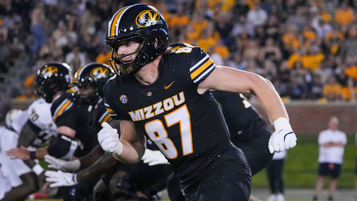 Aug 29, 2024; Columbia, Missouri, USA; Missouri Tigers tight end Brett Norfleet (87) runs off the line of scrimmage against the Murray State Racers during the game at Faurot Field at Memorial Stadium. Mandatory Credit: Denny Medley-Imagn Images Aug 29, 2024; Columbia, Missouri, USA; Missouri Tigers tight end Brett Norfleet (87) runs off the line of scrimmage against the Murray State Racers during the game at Faurot Field at Memorial Stadium. Mandatory Credit: Denny Medley-Imagn Images