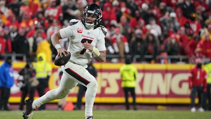 Jan 18, 2025; Kansas City, Missouri, USA; Houston Texans quarterback C.J. Stroud (7) rolls out to throw against the Kansas City Chiefs during the fourth quarter of a 2025 AFC divisional round game at GEHA Field at Arrowhead Stadium. Mandatory Credit: Denny Medley-Imagn Images