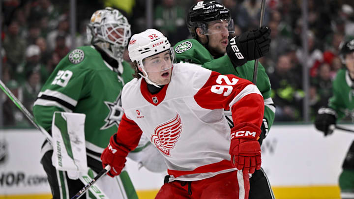 Jan 19, 2025; Dallas, Texas, USA; Detroit Red Wings center Marco Kasper (92) and Dallas Stars defenseman Ilya Lyubushkin (46) battle for position in the Stars crease during the first period at the American Airlines Center. Mandatory Credit: Jerome Miron-Imagn Images Jan 19, 2025; Dallas, Texas, USA; Detroit Red Wings center Marco Kasper (92) and Dallas Stars defenseman Ilya Lyubushkin (46) battle for position in the Stars crease during the first period at the American Airlines Center. Mandatory Credit: Jerome Miron-Imagn Images