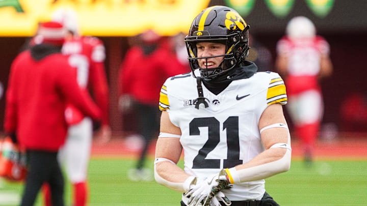 Nov 28, 2025; Lincoln, Nebraska, USA; Iowa Hawkeyes wide receiver Kaden Wetjen (21) warms up before the game against the Nebraska Cornhuskers at Memorial Stadium. Mandatory Credit: Dylan Widger-Imagn Images