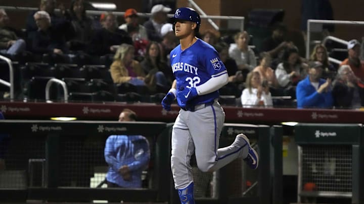 Mar 19, 2024; Scottsdale, Arizona, USA; Kansas City Royals first baseman Nick Pratto (32) hits a home run against the San Francisco Giants in the second inning at Scottsdale Stadium. Mandatory Credit: Rick Scuteri-Imagn Images