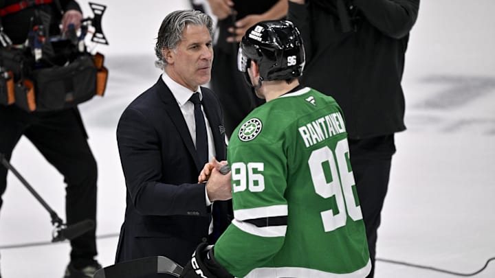 Colorado Avalanche head coach Jared Bednar shakes hands with Dallas Stars right wing Mikko Rantanen