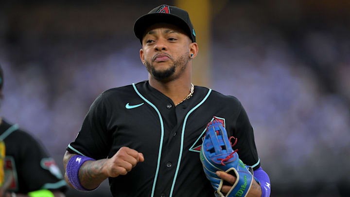 Mar 28, 2026; Los Angeles, California, USA;  Arizona Diamondbacks second baseman Ketel Marte (4) runs off the field during the game against the Los Angeles Dodgers at Dodger Stadium. Mandatory Credit: Jayne Kamin-Oncea-Imagn Images