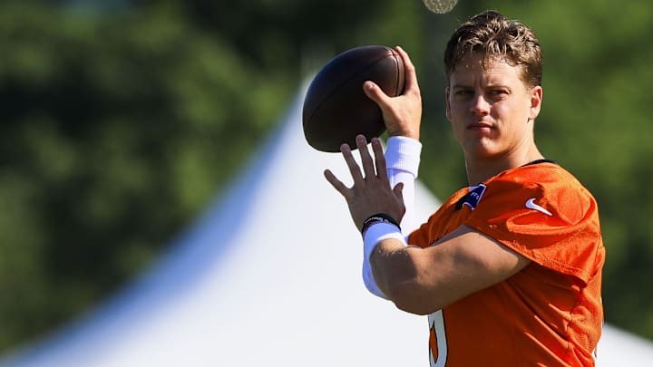 Jul 23, 2025; Cincinnati, OH, USA; Cincinnati Bengals quarterback Joe Burrow (9) throws a pass during training camp at Kettering Health Practice Field. 