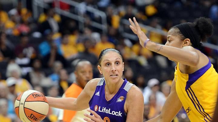 Sep 19, 2013; Los Angeles, CA, USA;  Los Angeles Sparks center Candace Parker (3) guards Phoenix Mercury guard Diana Taurasi (3) in the second half of game 1 of the Western Conference semi-finals at Staples Center. Phoenix won 86-75. Mandatory Credit: Jayne Kamin-Oncea-Imagn Images