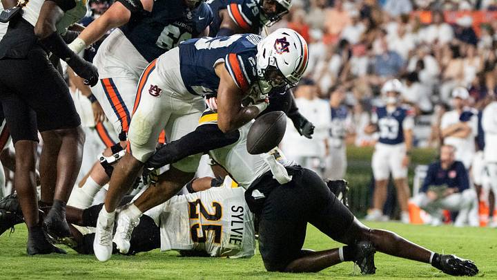 Auburn running back Jeremiah Cobb (23) fumbles the ball as the Tigers take on Southern Miss at Jordan-Hare Stadium in Auburn, Ala. on Saturday, Sept. 12, 2026. Auburn defeated Southern Miss, 43-8. Auburn running back Jeremiah Cobb (23) fumbles the ball as the Tigers take on Southern Miss at Jordan-Hare Stadium in Auburn, Ala. on Saturday, Sept. 12, 2026. Auburn defeated Southern Miss, 43-8.