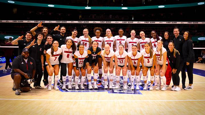 Louisville Volleyball celebrates their season opening win against Texas A&M at the AVCA Showcase in Milwaukee. Louisville Volleyball celebrates their season opening win against Texas A&M at the AVCA Showcase in Milwaukee.